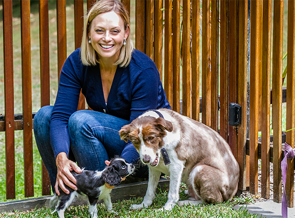 Dr. Danielle, Wellness Veterinarian, with a puppy